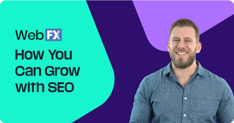 a man is smiling in front of a banner that says Web FX.